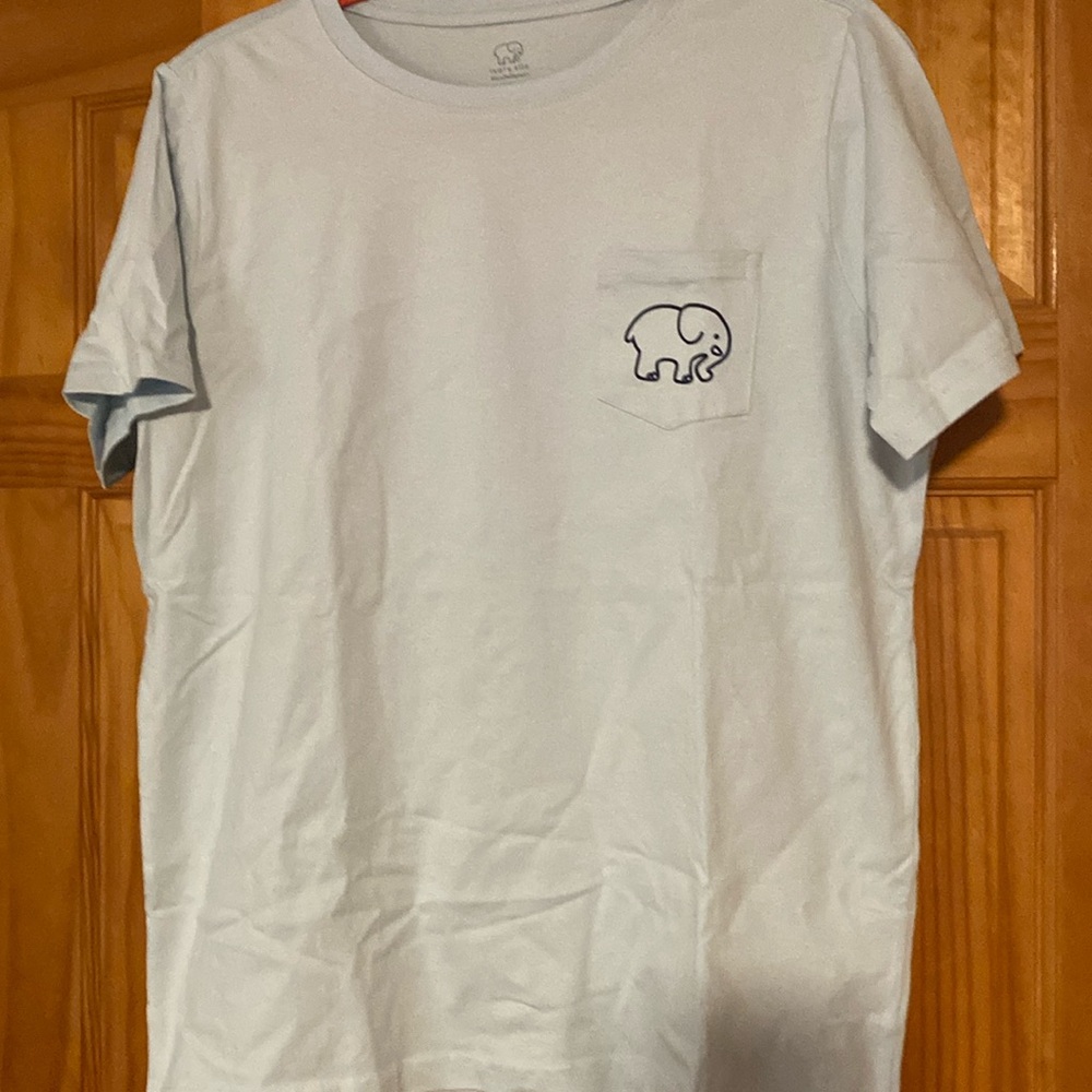 Ivory Ella TShirt with a pocket. Light Blue Size Medium